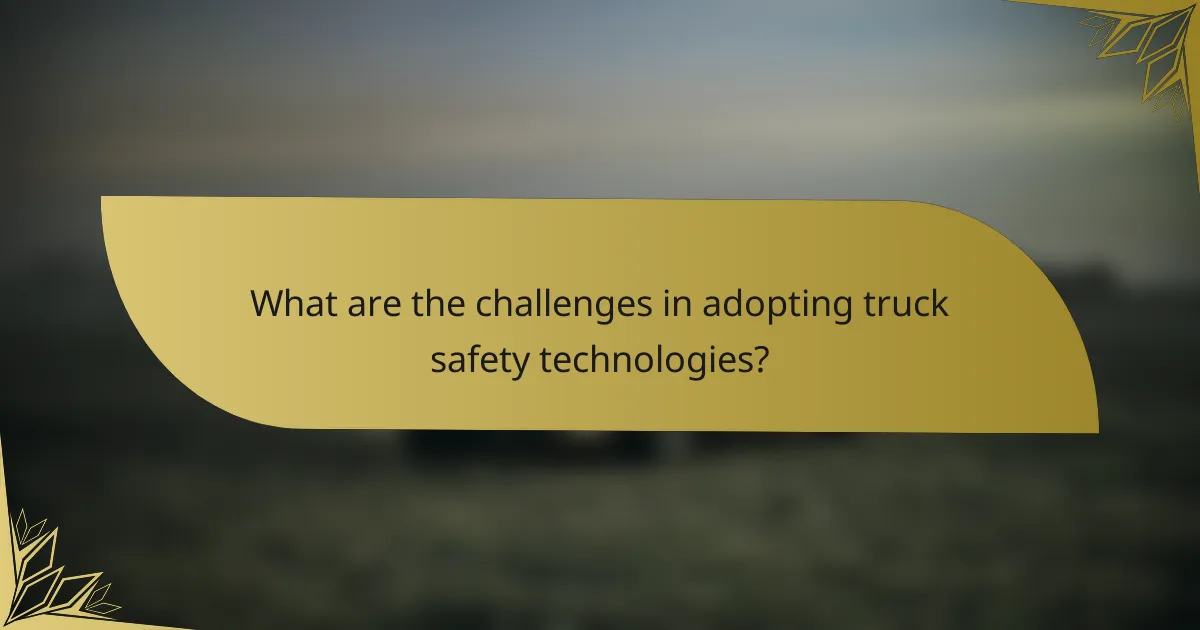 What are the challenges in adopting truck safety technologies?